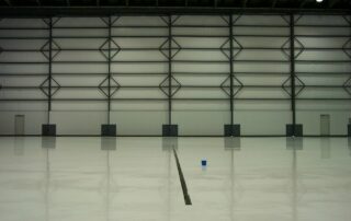 This image shows a warehouse with epoxy floor.